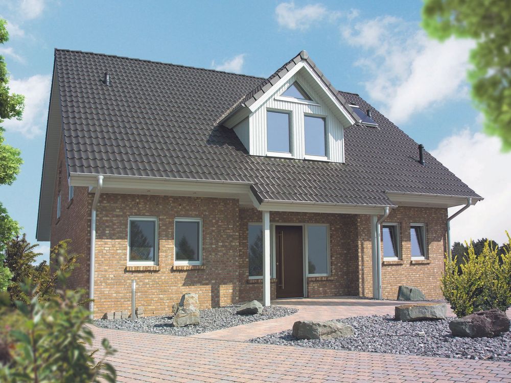 Fertighaus mit Klinkerfassade und Dachgaube